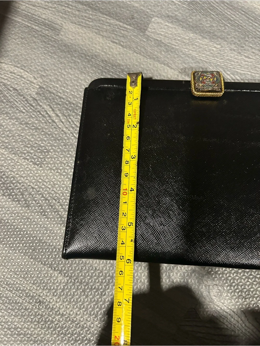 Elegant Black Evening Clutch with Decorative Gold Accent
